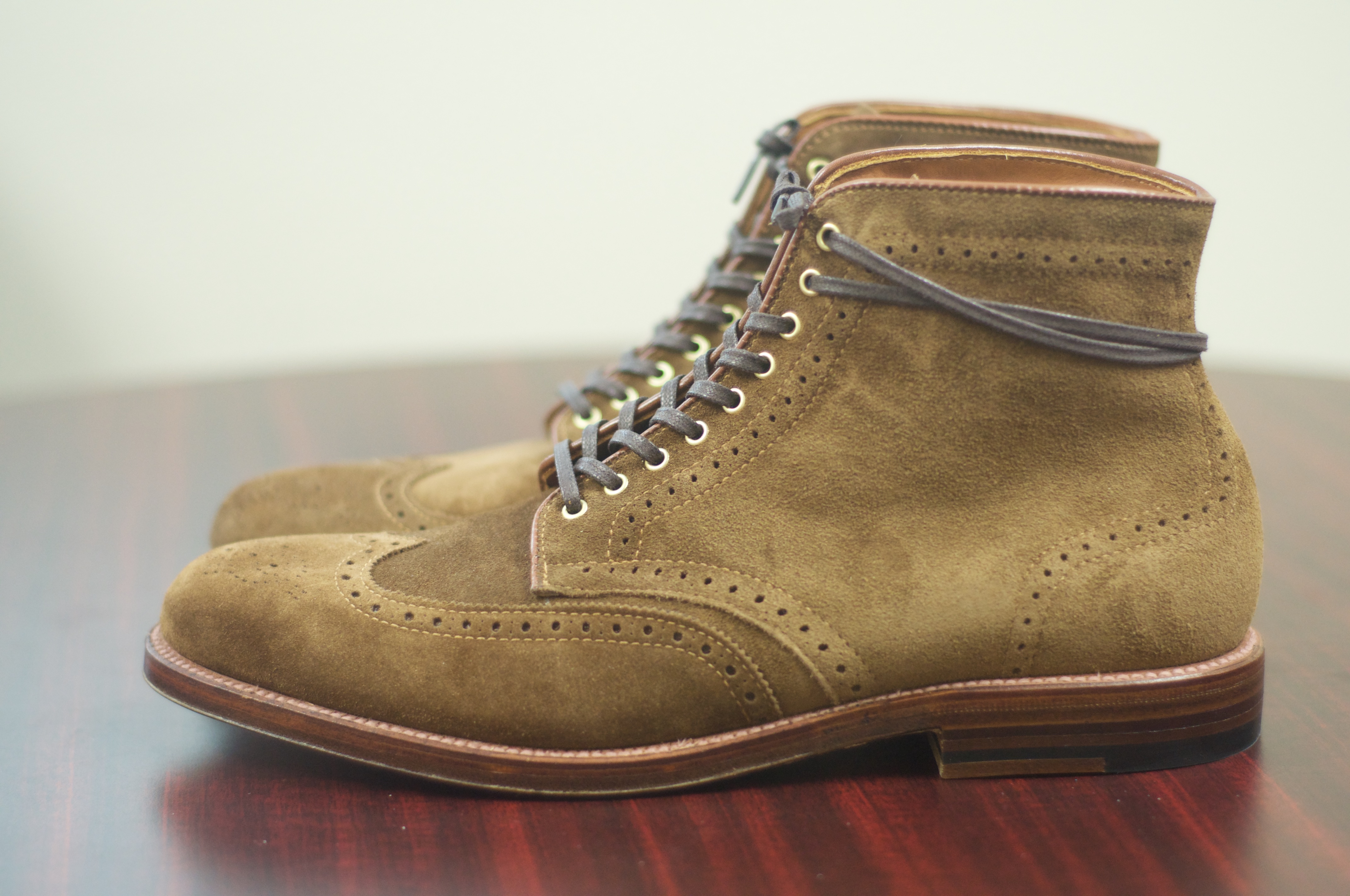 suede wingtip boot